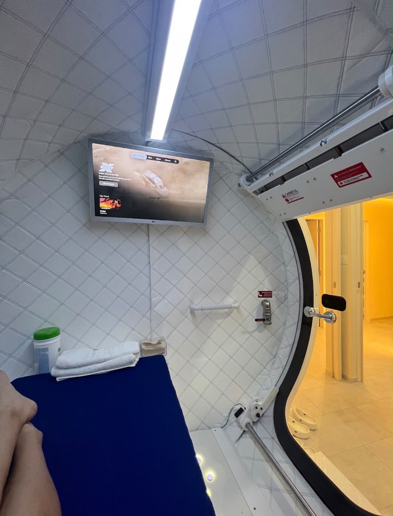Hyperbaric chamber with mounted TV screen