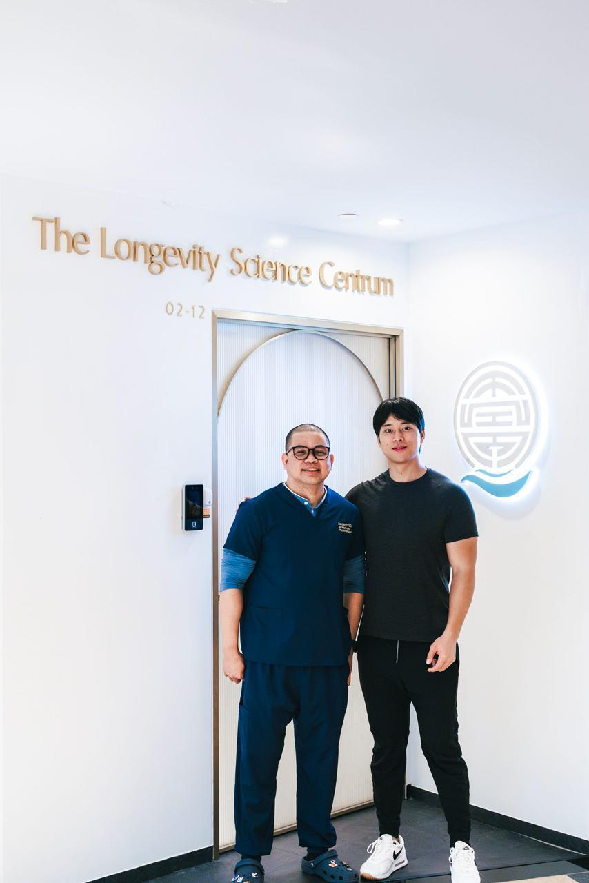 Gold lettering at the entrance of The Longevity Science Centrum in Guthrie House