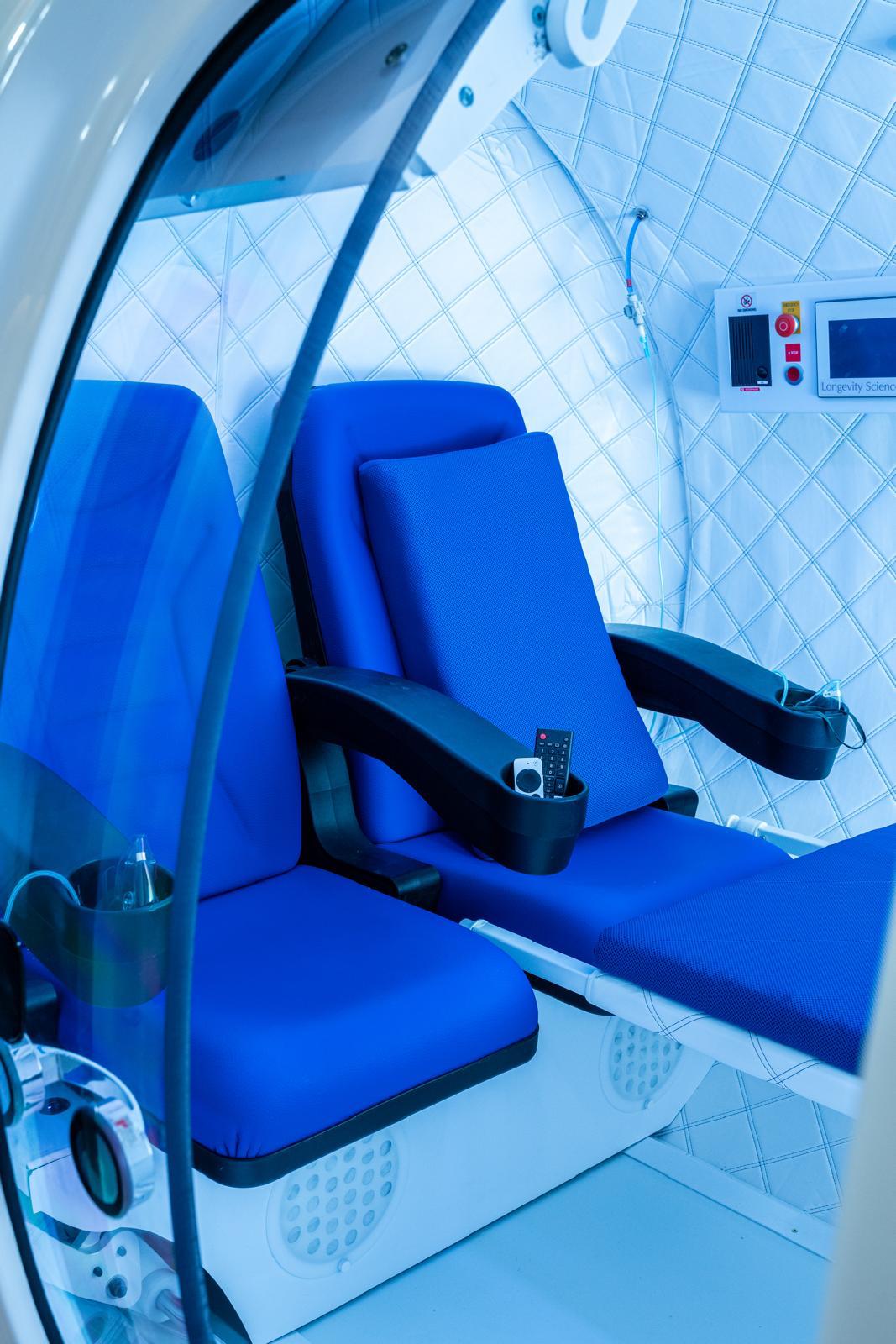 Hyperbaric chamber interior lit in blue