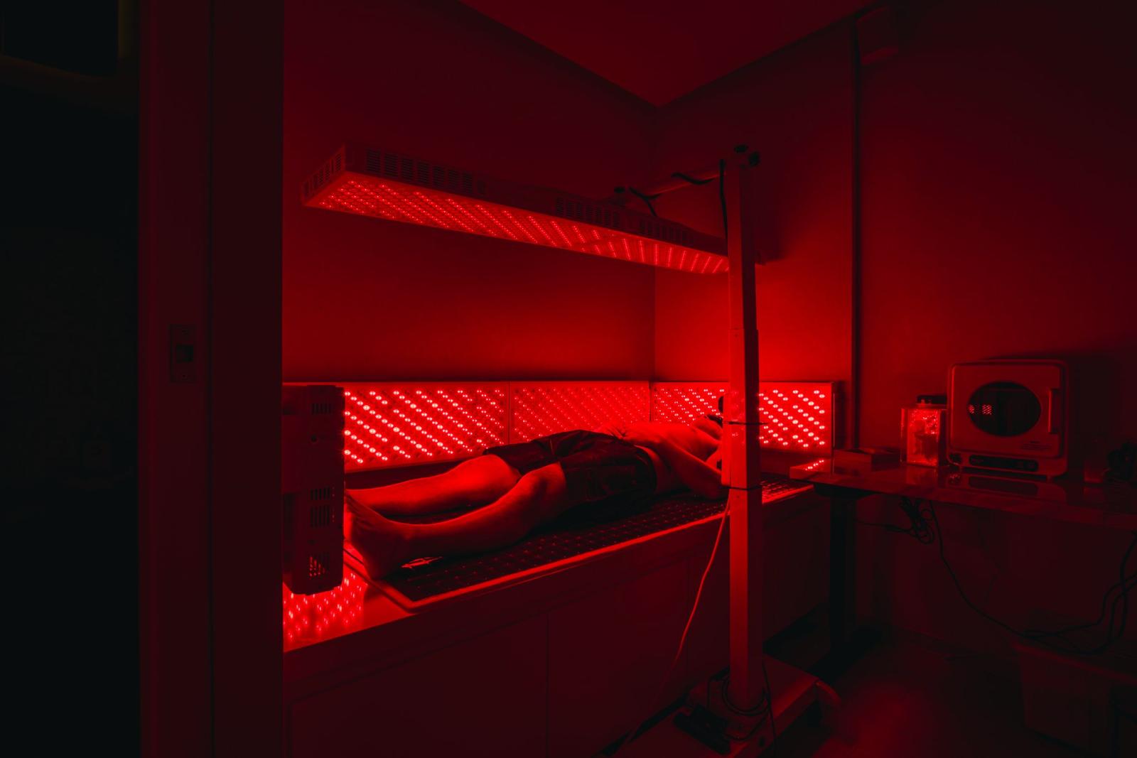 Red-lit photobiomodulation therapy room